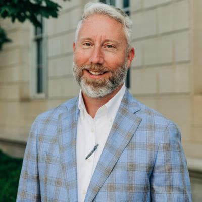 Headshot image of John M. Stone